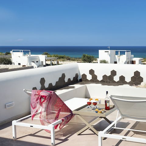 Soak up the Sicilian sun on the upstairs terrace