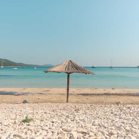 Enjoy the sea air at Agios Isidoros beach, a five-minute drive away