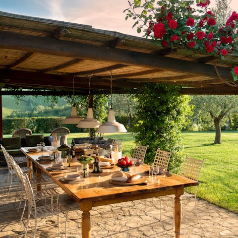 Gather for meals under the charming pergola