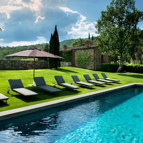 Soak up the Tuscan sun by the pool