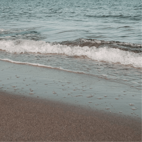 Spend the day on the warm sands of Magaggiari Beach, 1 kilometre away