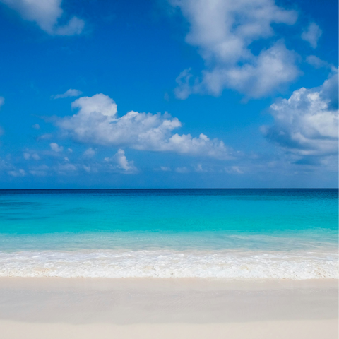 Discover the white sand beach, just a one-minute stroll