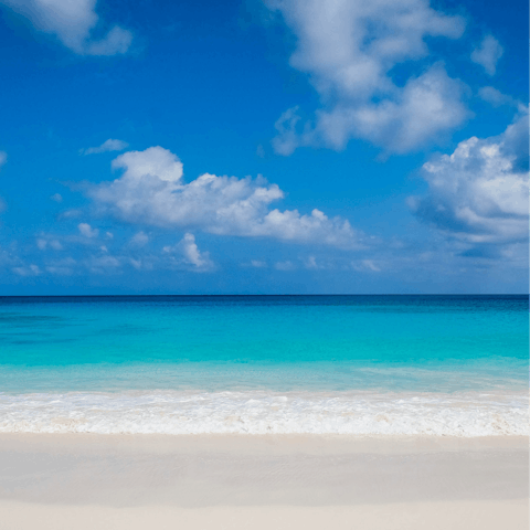 Discover the white sand beach, just a one-minute stroll
