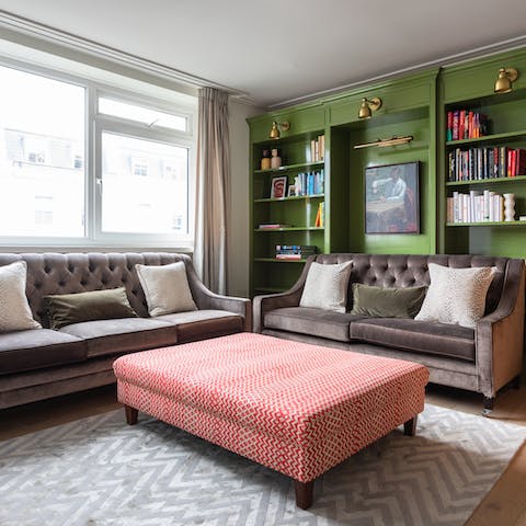 Unwind in the cosy living area with a good book