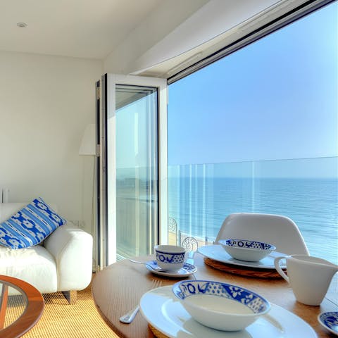 Enjoy incredible sea views while relaxing in the living room