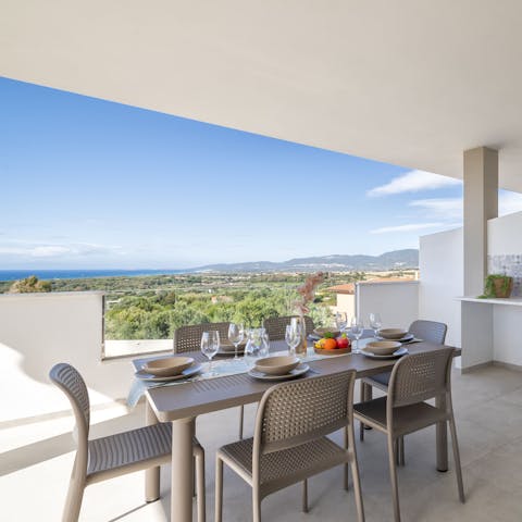 Gather on the balcony for far-reaching sea views