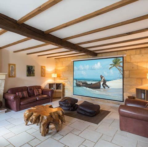 Cosy up in the home cinema room