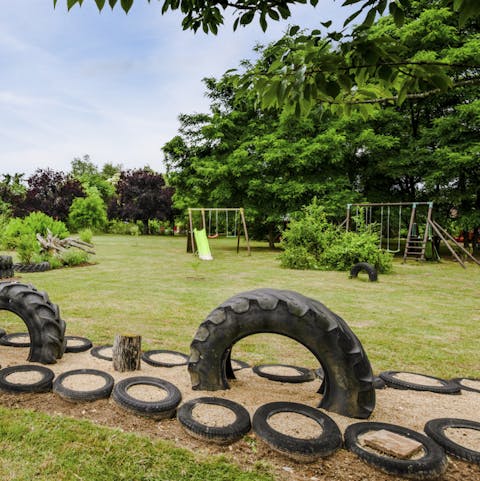 Keep kids entertained with the swings, slides and sand pit in the play area