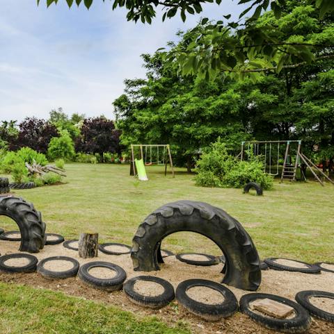 Keep kids entertained with the swings, slides and sand pit in the play area