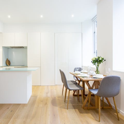 Host a fancy dinner party in the bright dining area and open kitchen