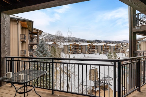 Sip your morning coffee overlooking snow-dusted mountain slopes