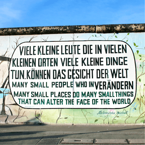 Visit the East Side Gallery, a twenty-minute walk away