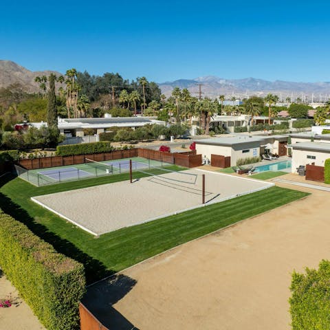 Make the most of the private pickleball court, beach volleyball and putting green