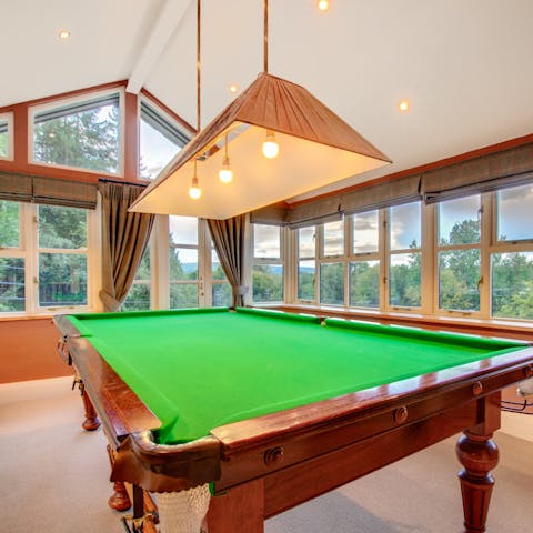 Challenge your friends to a round of pool in the games room