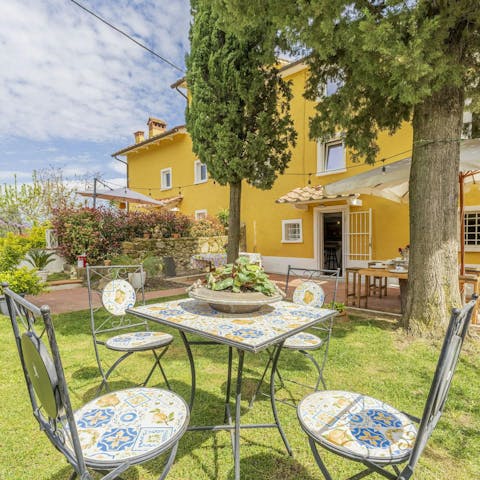 Enjoy pastries and fresh fruit in the sunny garden