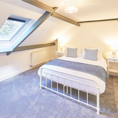 Drift off to sleep in the main bedroom as the stars twinkle in the skylights  overhead