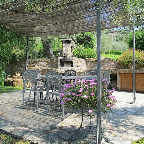 Dine on local pastas and fresh produce beneath the shaded pergola