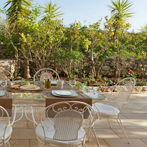 Fire up the barbecue grill and tuck into an alfresco feast under the setting sun