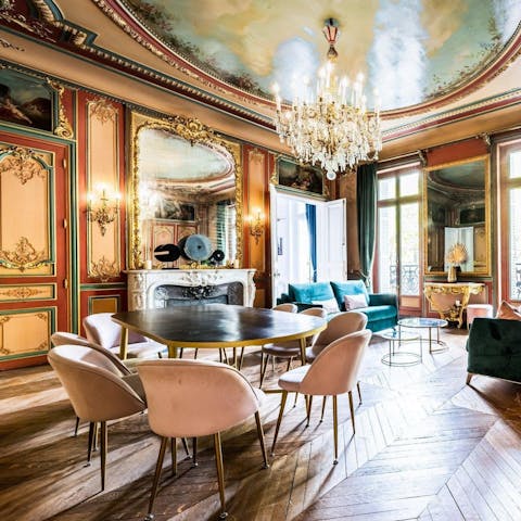 Admire the gilded gold touches and old-world charm of your apartment