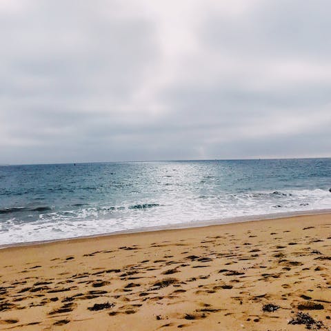Soak up the sun on Pacifica State Beach, a ten-minute walk away