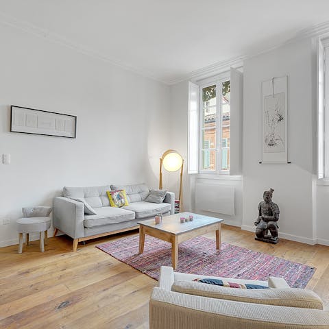 Open up these white shutters and let the natural light pour into your living space