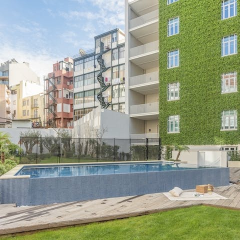 Head to the building's shared pool for a cooling dip