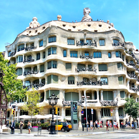 See the architecture of Casa Milà up close – it's a short walk away