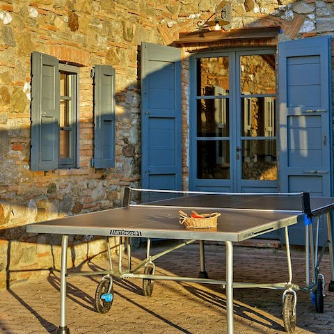 Enjoy a game of ping pong on the patio in the evening sun