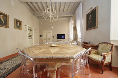 Gather for meals under grand historic ceilings in the heart of Rome