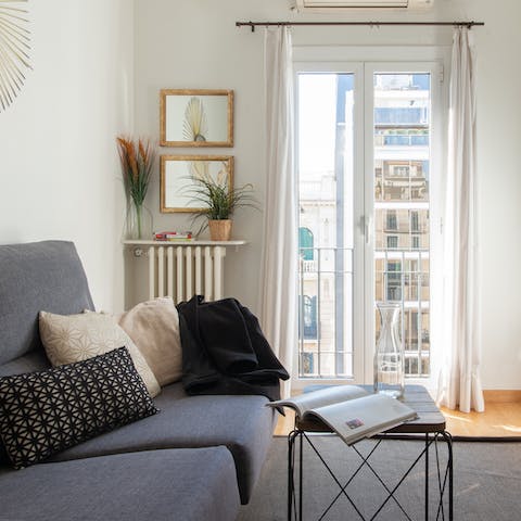 Kick back in the bright living room after a day of exploring the city on foot