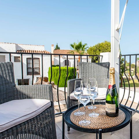 Enjoy a bottle of bubbly on the terrace