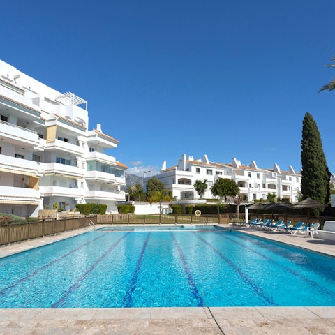 Dive into the communal swimming pool to beat the heat