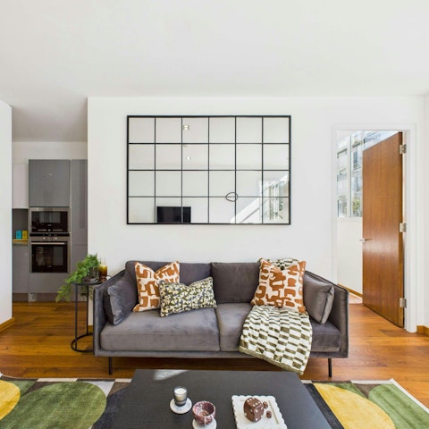 Sit back and relax in the bright living space with your tipple of choice