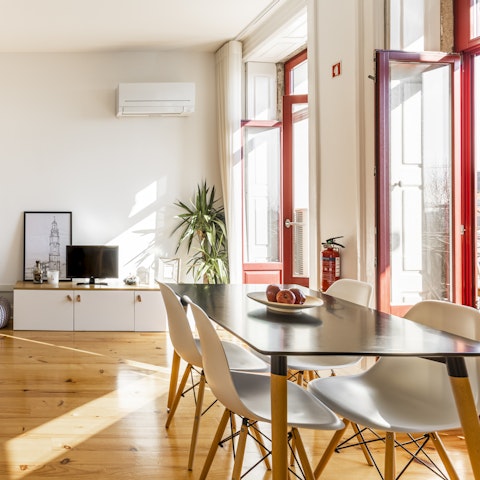 Fling open the red French doors to bathe the living area in sunlight