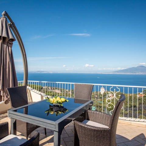 Dine alfresco with far-reaching sea views