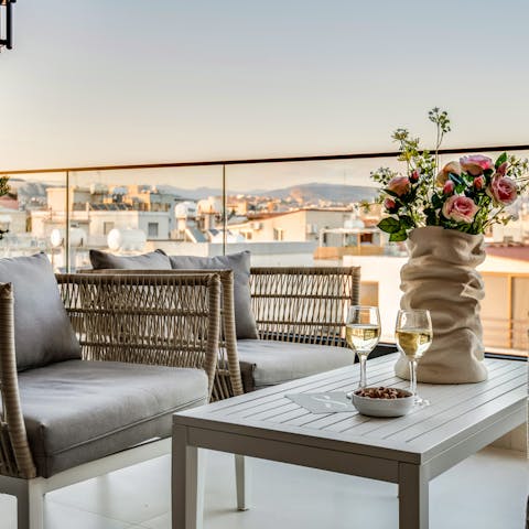 Admire the sunset from your private terrace, cocktail in hand