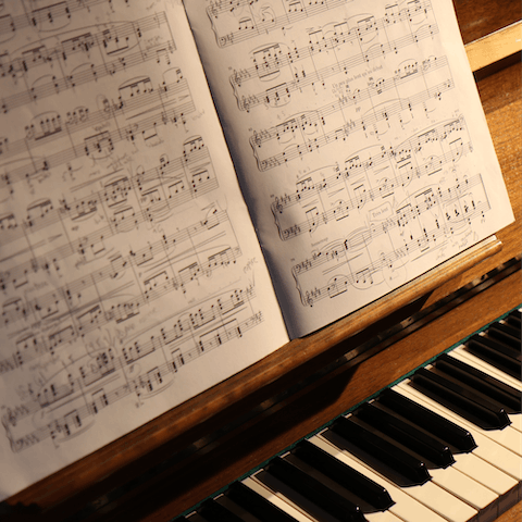 Gather everyone around the piano for a jam session