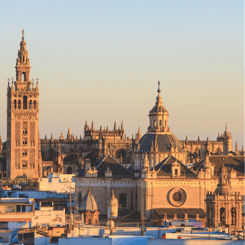 Visit Seville Cathedral and see its iconic bell tower, a five-minutes walk