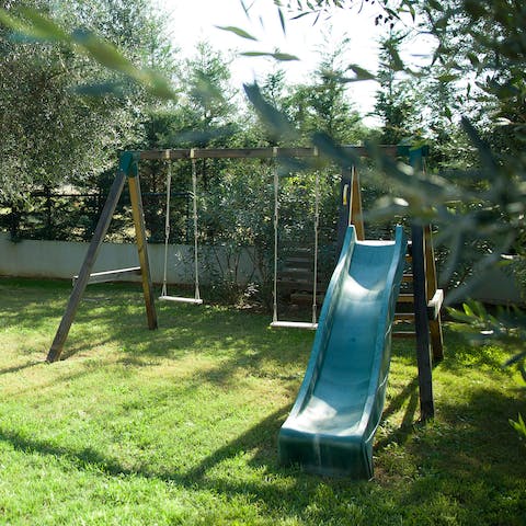 Push your little ones on the swings