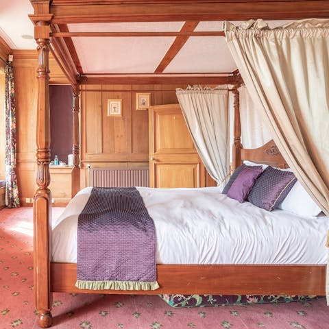 Sleep like royalty in the elegant four-poster bed