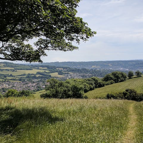 Follow hiking and cycle trails through the Cotswolds countryside