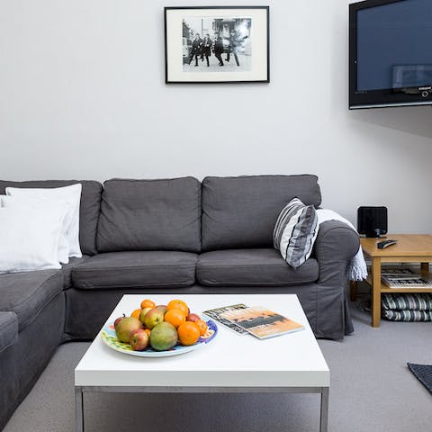 Get comfy on the L-shaped couch after a busy day sightseeing