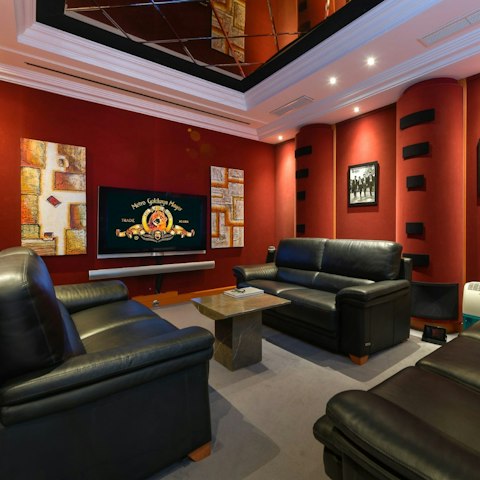 Gather for cosy movie nights in the home cinema