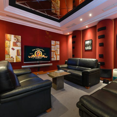 Gather for cosy movie nights in the home cinema