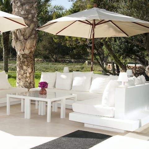 Pour a glass of your favourite drink and watch the sunset from the garden