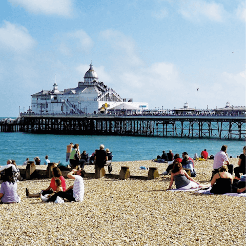 Drive twenty minutes to Eastbourne for an ice cream on the pier