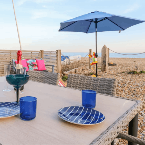 Gather for sundowners with breathtaking sea views