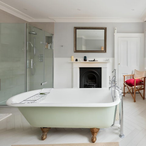 Soak in the elegant freestanding bathtub