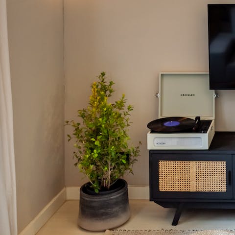 Stick some tunes on the record player as you sip wine in the lounge