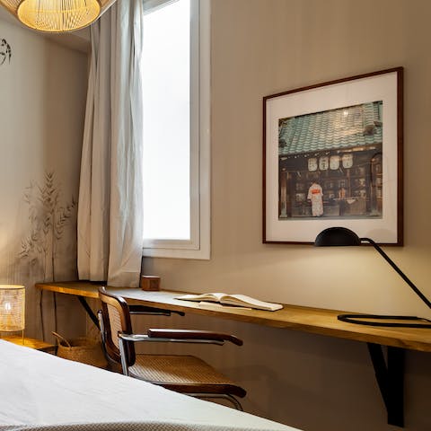 Catch up with your inbox at the dedicated workspace in the bedroom